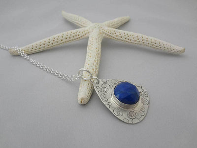 silver pendant with lapis lazuli