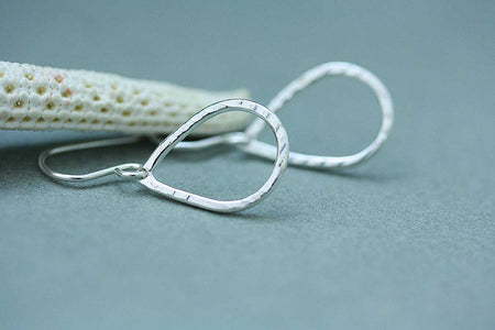 Silver open tear drop earrings