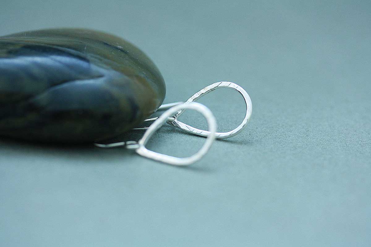 Silver open tear drop earrings