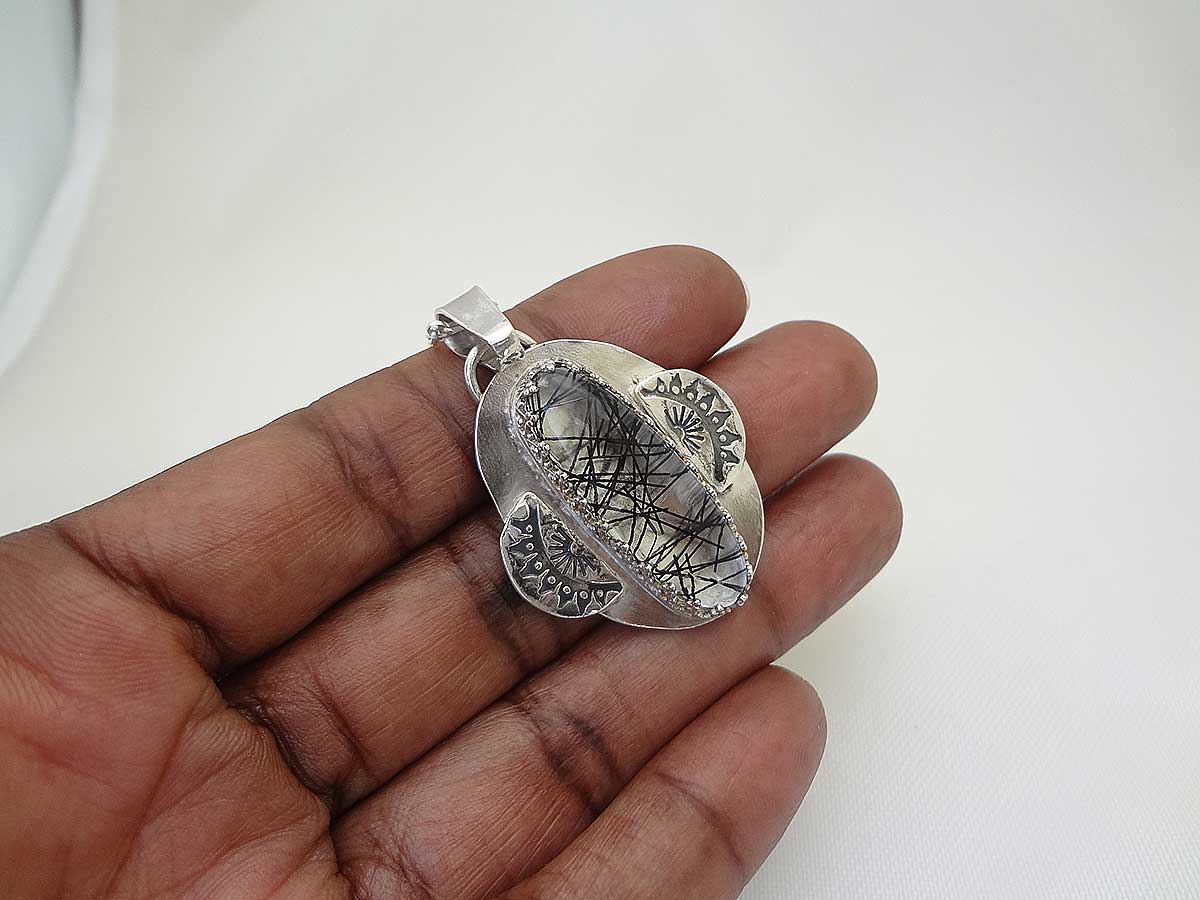 Coura Rutilated quartz and silver necklace pendant