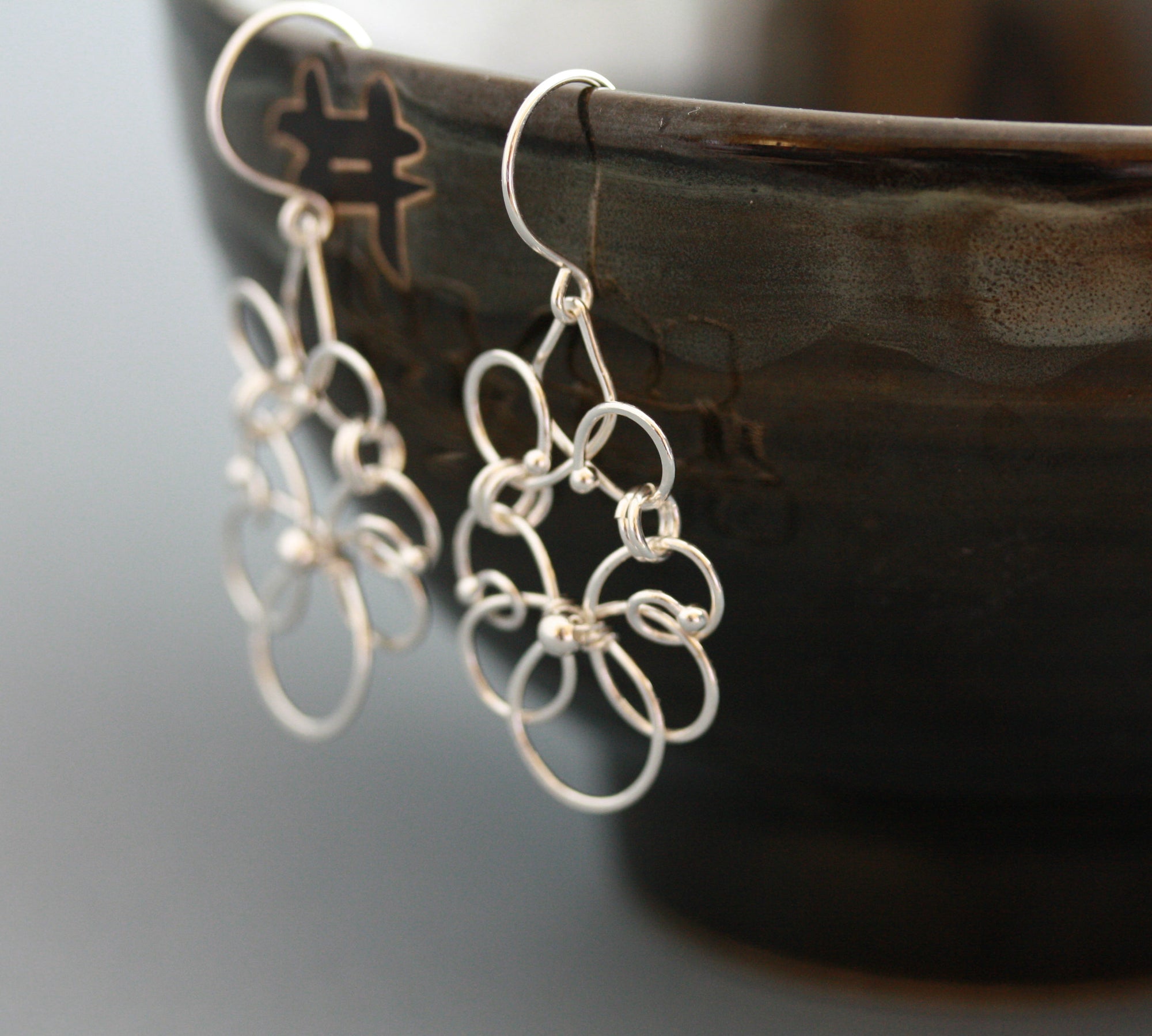 Elance silver chandelier earrings.