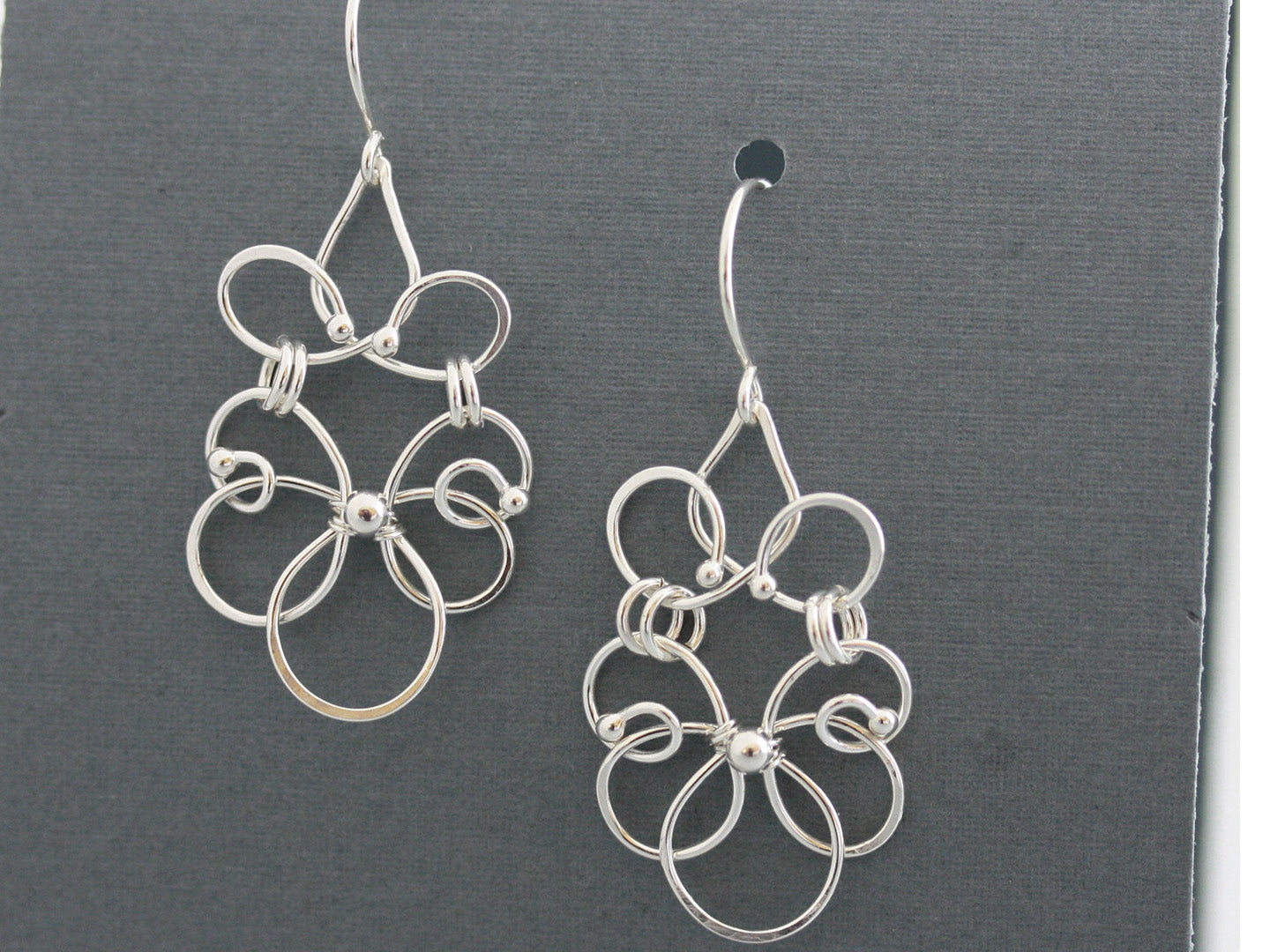 Elance silver chandelier earrings.