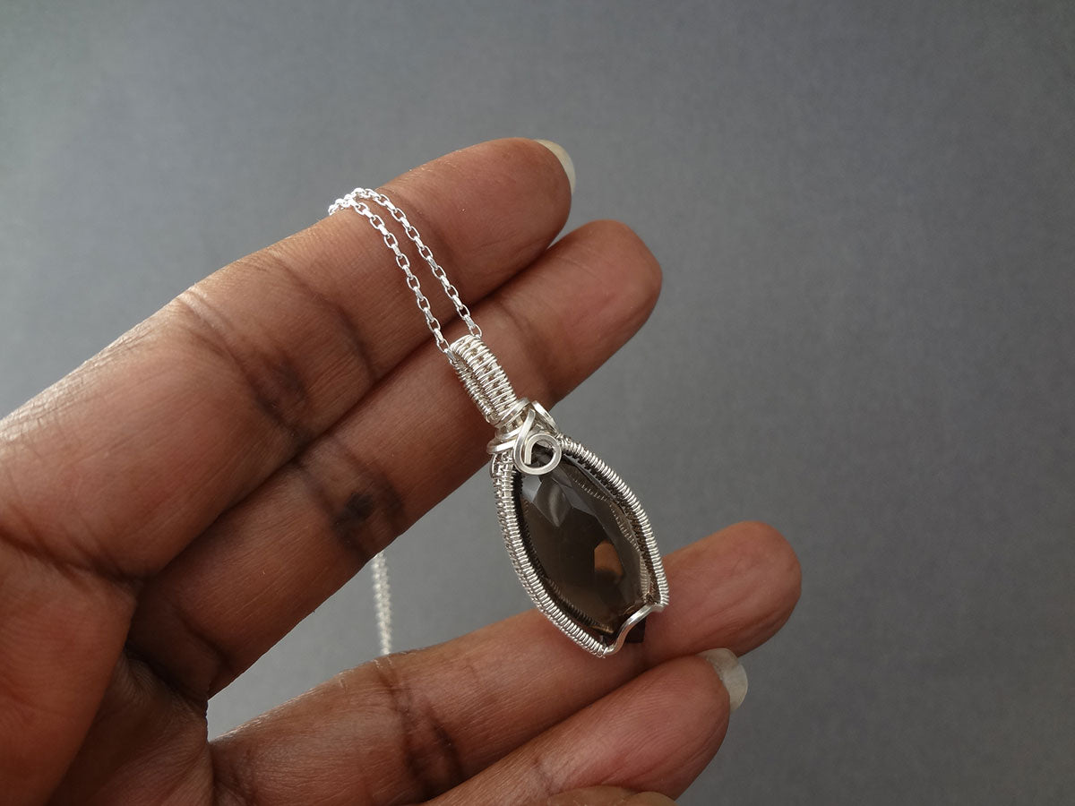 Mozambique wire wrapped sterling silver necklace pendant