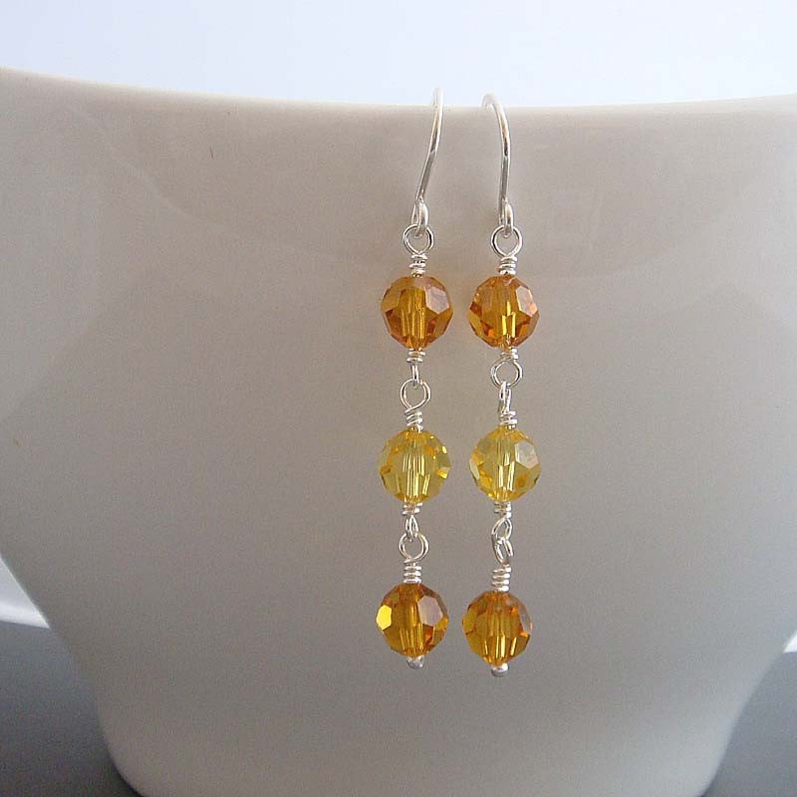 Sunshine Silver dangle earrings made by hand