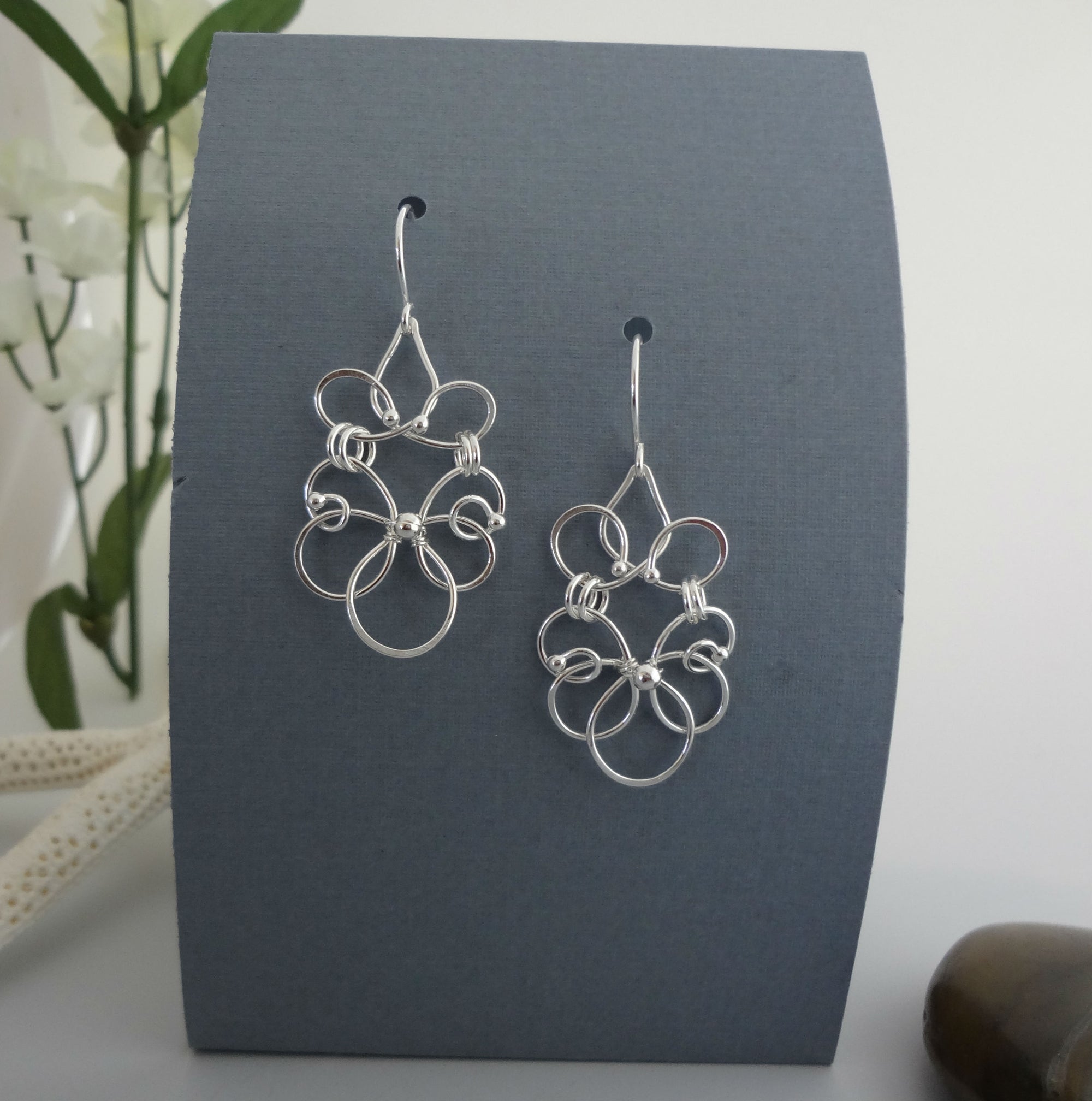 Elance silver chandelier earrings.