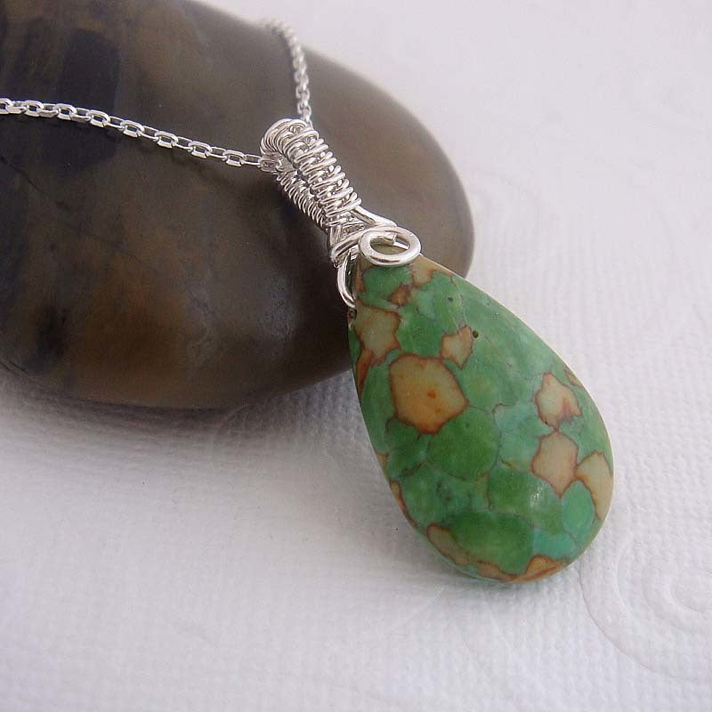 Green turquoise and silver pendant